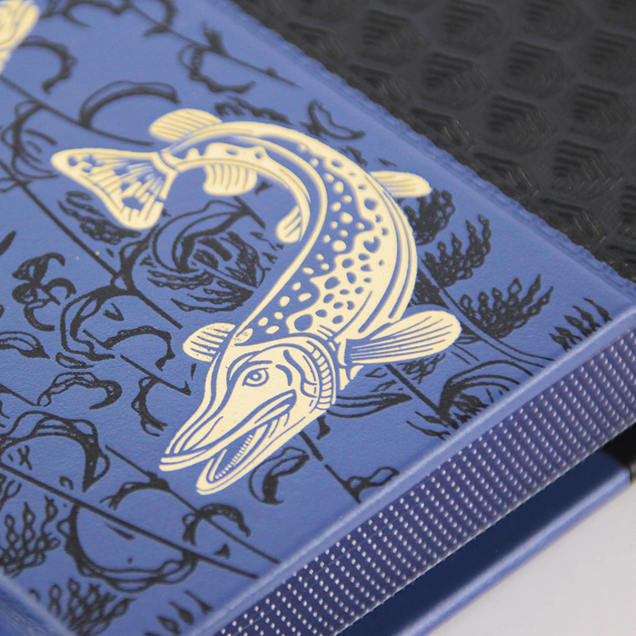 A gift set "Shchuchy" with the book "The Big Book of Russian fishing" and pike figurines